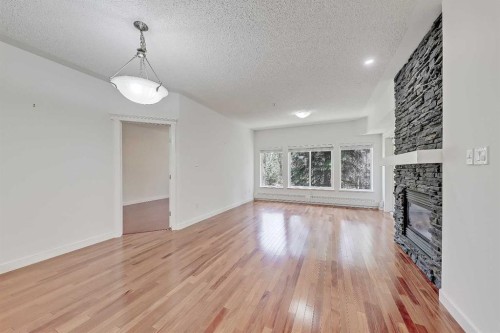 120-20 Discovery Ridge Close Sw, Calgary, AB - Indoor With Fireplace