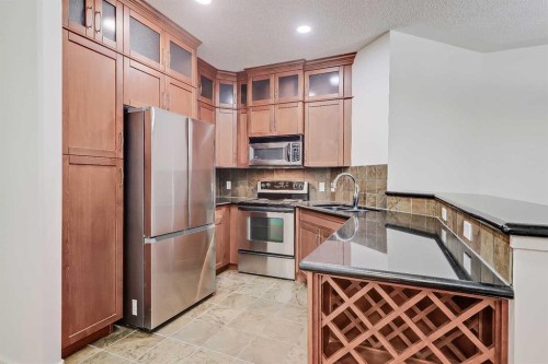 120-20 Discovery Ridge Close Sw, Calgary, AB - Indoor Photo Showing Kitchen With Stainless Steel Kitchen With Double Sink