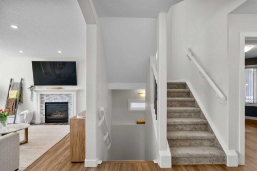 42 Gleneagles Terrace, Cochrane, AB - Indoor With Fireplace