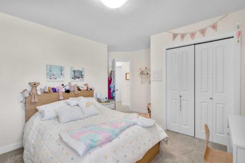 42 Gleneagles Terrace, Cochrane, AB - Indoor Photo Showing Bedroom