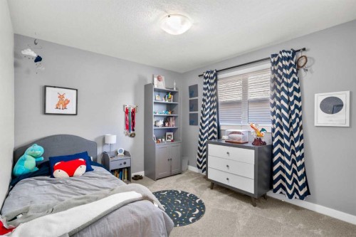 42 Gleneagles Terrace, Cochrane, AB - Indoor Photo Showing Bedroom