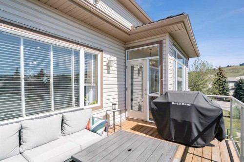 42 Gleneagles Terrace, Cochrane, AB - Outdoor With Deck Patio Veranda With Exterior