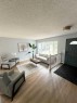 16 Woodfield Court Sw, Calgary, AB  - Indoor Photo Showing Living Room 