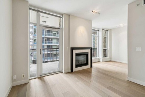 416-222 Riverfront Avenue Sw, Calgary, AB - Indoor With Fireplace