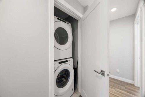 309 Wentworth Row Sw, Calgary, AB - Indoor Photo Showing Laundry Room