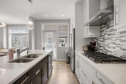 309 Wentworth Row Sw, Calgary, AB - Indoor Photo Showing Kitchen With Stainless Steel Kitchen With Double Sink With Upgraded Kitchen