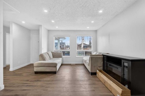128 Castledale Crescent Ne, Calgary, AB - Indoor Photo Showing Living Room