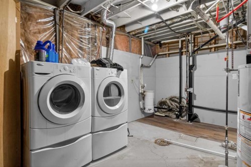 128 Castledale Crescent Ne, Calgary, AB - Indoor Photo Showing Laundry Room