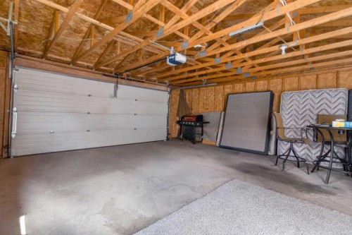 128 Castledale Crescent Ne, Calgary, AB - Indoor Photo Showing Garage