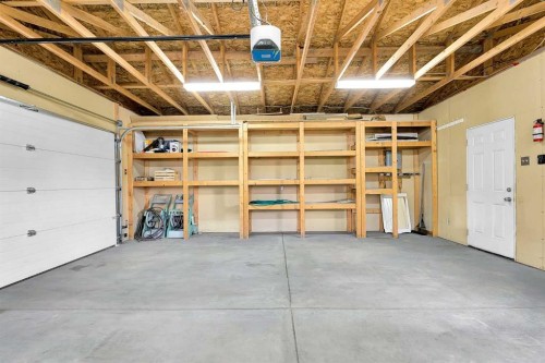 247 Evermeadow Avenue Sw, Calgary, AB - Indoor Photo Showing Garage
