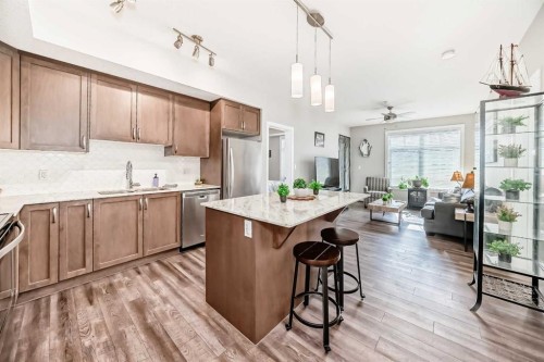 1212-3727 Sage Hill Drive Nw, Calgary, AB - Indoor Photo Showing Kitchen With Stainless Steel Kitchen With Upgraded Kitchen