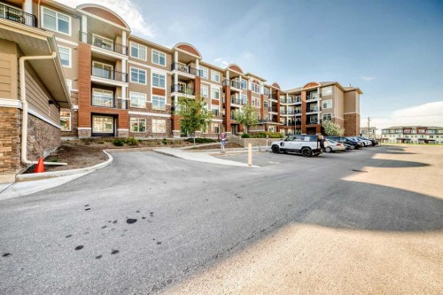 1212-3727 Sage Hill Drive Nw, Calgary, AB - Outdoor With Balcony With Facade