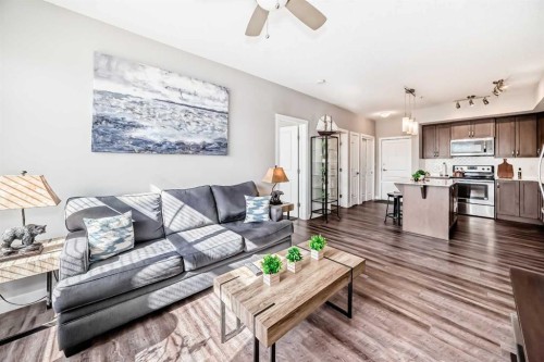 1212-3727 Sage Hill Drive Nw, Calgary, AB - Indoor Photo Showing Living Room