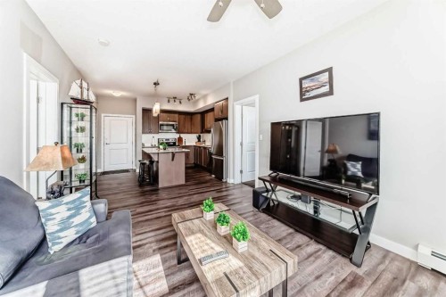 1212-3727 Sage Hill Drive Nw, Calgary, AB - Indoor Photo Showing Living Room
