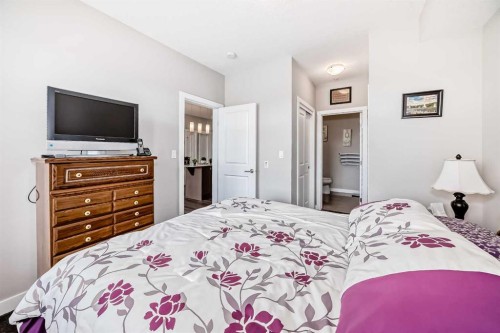 1212-3727 Sage Hill Drive Nw, Calgary, AB - Indoor Photo Showing Bedroom