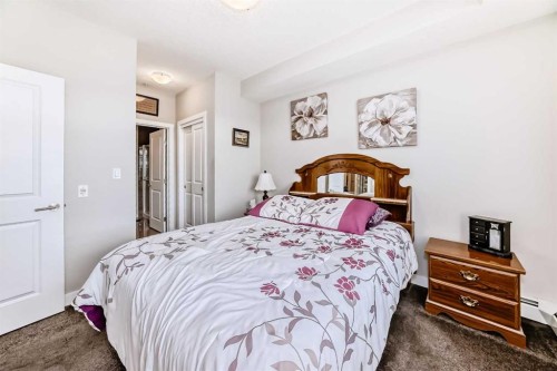 1212-3727 Sage Hill Drive Nw, Calgary, AB - Indoor Photo Showing Bedroom