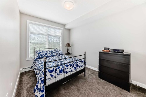 1212-3727 Sage Hill Drive Nw, Calgary, AB - Indoor Photo Showing Bedroom
