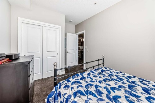1212-3727 Sage Hill Drive Nw, Calgary, AB - Indoor Photo Showing Bedroom