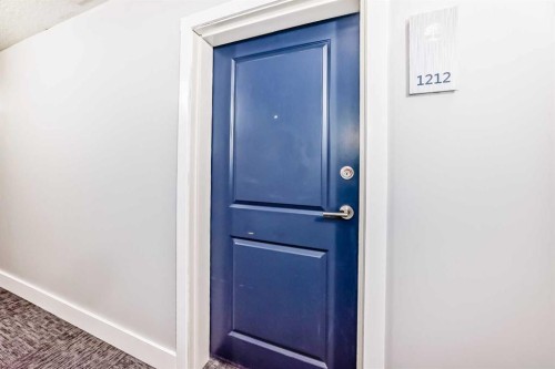 1212-3727 Sage Hill Drive Nw, Calgary, AB - Indoor Photo Showing Other Room