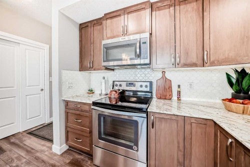 1212-3727 Sage Hill Drive Nw, Calgary, AB - Indoor Photo Showing Kitchen