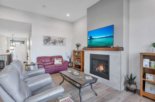11 Vireo Avenue, Olds, AB - Indoor Photo Showing Living Room With Fireplace