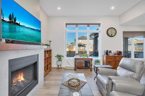 11 Vireo Avenue, Olds, AB - Indoor Photo Showing Living Room With Fireplace