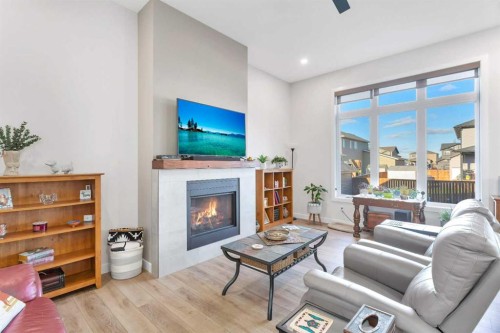 11 Vireo Avenue, Olds, AB - Indoor Photo Showing Living Room With Fireplace