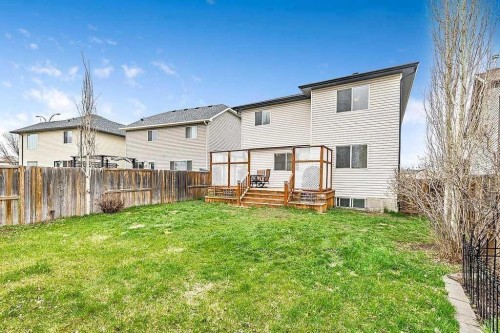 105 Cimarron Park Circle, Okotoks, AB - Outdoor With Deck Patio Veranda