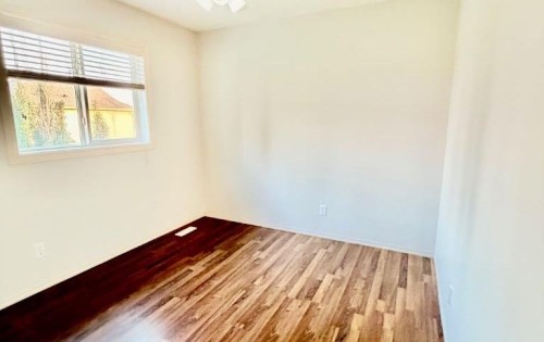 105 Cimarron Park Circle, Okotoks, AB - Indoor Photo Showing Other Room