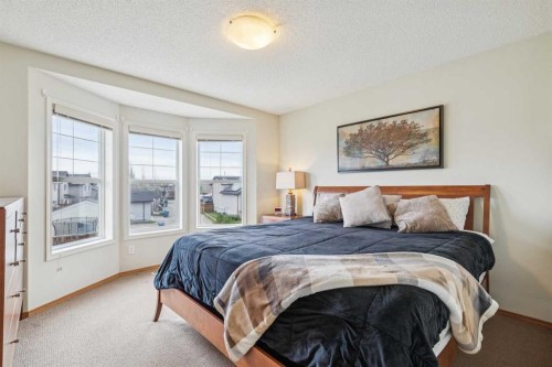 146 Cranberry Close Se, Calgary, AB - Indoor Photo Showing Bedroom