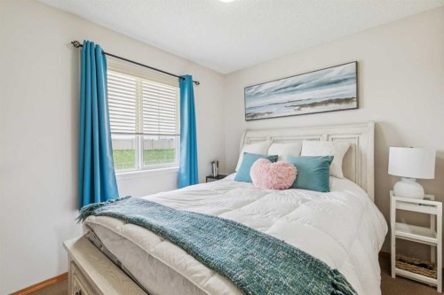 146 Cranberry Close Se, Calgary, AB - Indoor Photo Showing Bedroom