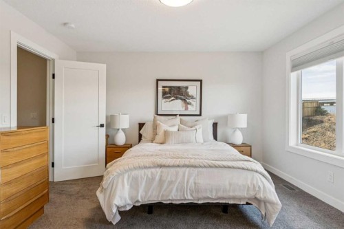 24 Willow Park Point, Cochrane, AB - Indoor Photo Showing Bedroom