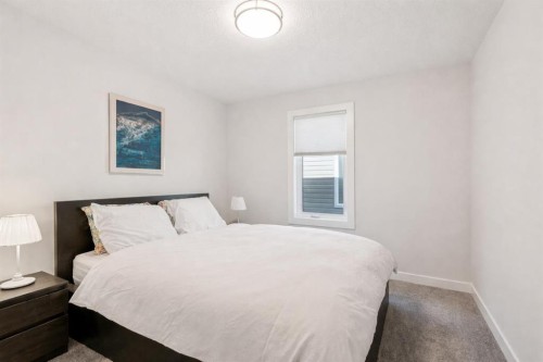 24 Willow Park Point, Cochrane, AB - Indoor Photo Showing Bedroom