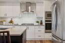 24 Willow Park Point, Cochrane, AB  - Indoor Photo Showing Kitchen With Upgraded Kitchen 