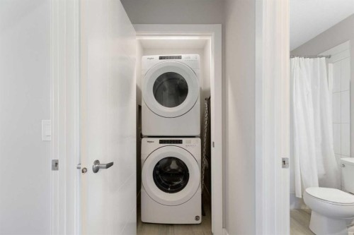 5 D'Arcy Boulevard, Okotoks, AB - Indoor Photo Showing Laundry Room