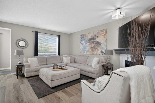 176 Chapalina Heights Se, Calgary, AB - Indoor Photo Showing Living Room