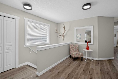 176 Chapalina Heights Se, Calgary, AB - Indoor Photo Showing Other Room