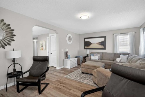 176 Chapalina Heights Se, Calgary, AB - Indoor Photo Showing Living Room