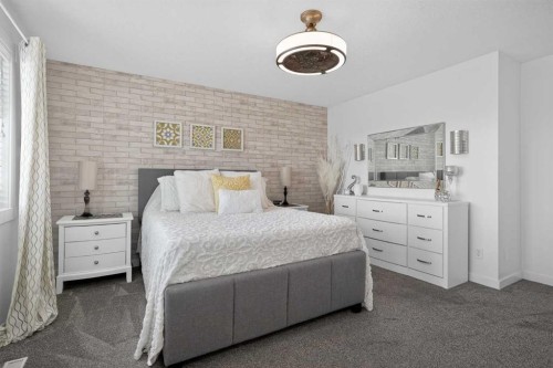 176 Chapalina Heights Se, Calgary, AB - Indoor Photo Showing Bedroom