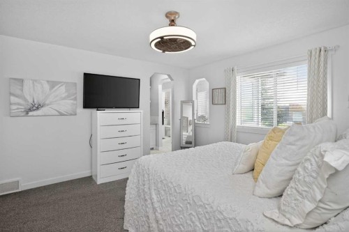 176 Chapalina Heights Se, Calgary, AB - Indoor Photo Showing Bedroom
