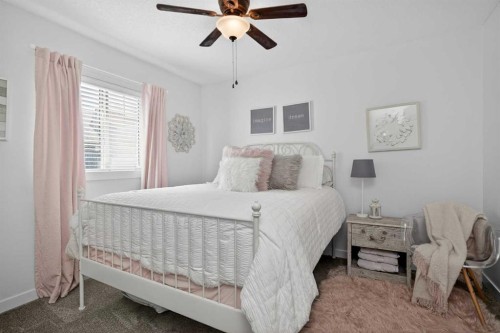 176 Chapalina Heights Se, Calgary, AB - Indoor Photo Showing Bedroom