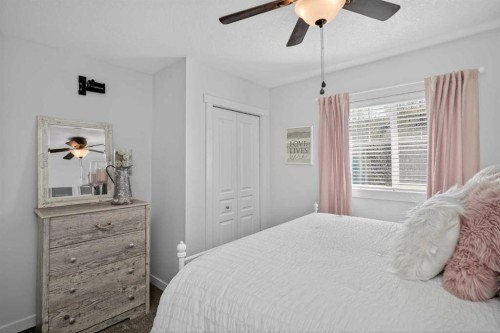 176 Chapalina Heights Se, Calgary, AB - Indoor Photo Showing Bedroom