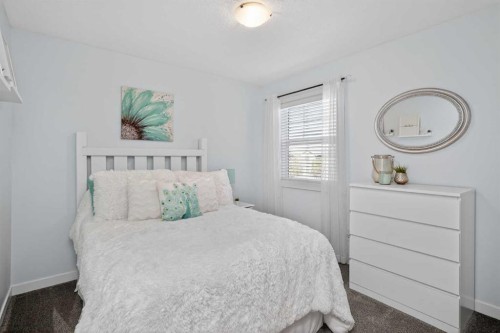 176 Chapalina Heights Se, Calgary, AB - Indoor Photo Showing Bedroom