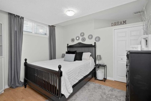 176 Chapalina Heights Se, Calgary, AB - Indoor Photo Showing Bedroom
