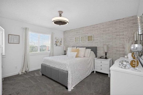 176 Chapalina Heights Se, Calgary, AB - Indoor Photo Showing Bedroom