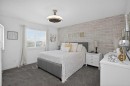 176 Chapalina Heights Se, Calgary, AB  - Indoor Photo Showing Bedroom 