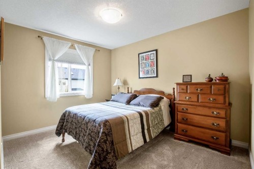 1503 Montgomery Place Se, High River, AB - Indoor Photo Showing Bedroom