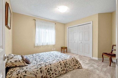 1503 Montgomery Place Se, High River, AB - Indoor Photo Showing Bedroom