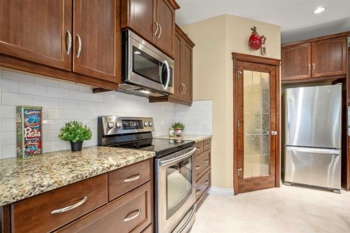 1503 Montgomery Place Se, High River, AB - Indoor Photo Showing Kitchen With Stainless Steel Kitchen With Upgraded Kitchen