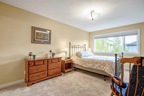 1503 Montgomery Place Se, High River, AB - Indoor Photo Showing Bedroom